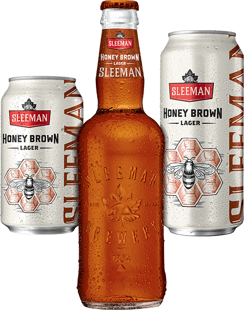 A bottle of Sleeman Clear 2.0 between a 355 ml can and a 473 ml can.