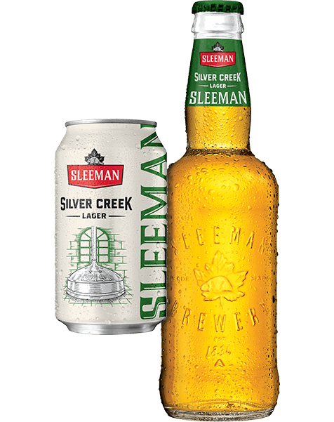 A bottle of Sleeman Clear 2.0 between a 355 ml can and a 473 ml can.